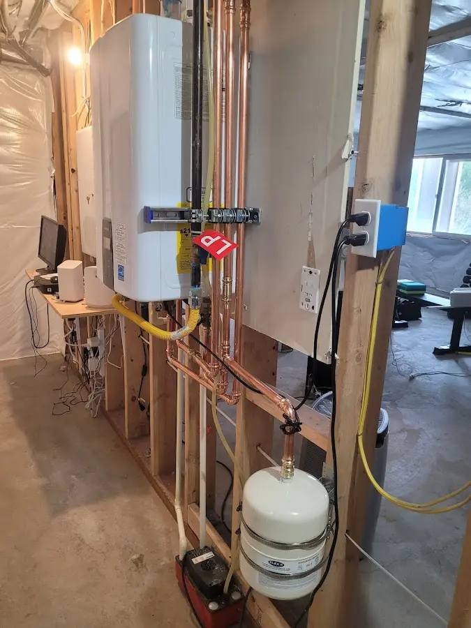 Licensed plumber repairing a kitchen sink in Ripley